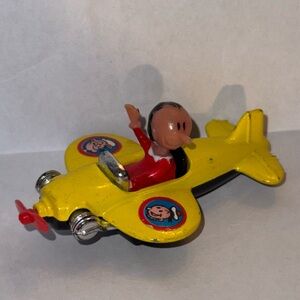 vintage 1980 Corgi Juniors Olive Oyl yellow airplane from the Popeye cartoon